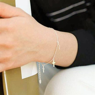 Woman Wearing Classic Minimalist Multiple 5 Cross Sterling Silver Bracelet