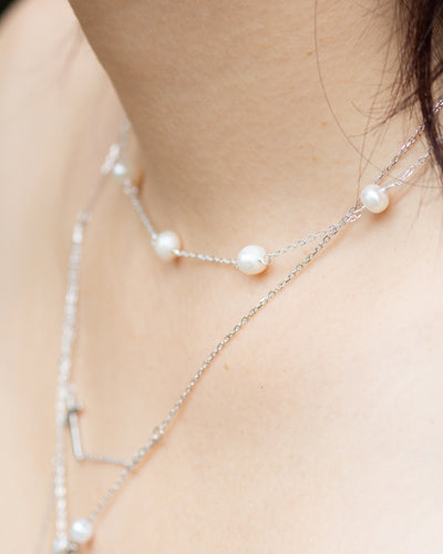 Yumei wearing classic pearl choker dainty sterling silver necklace