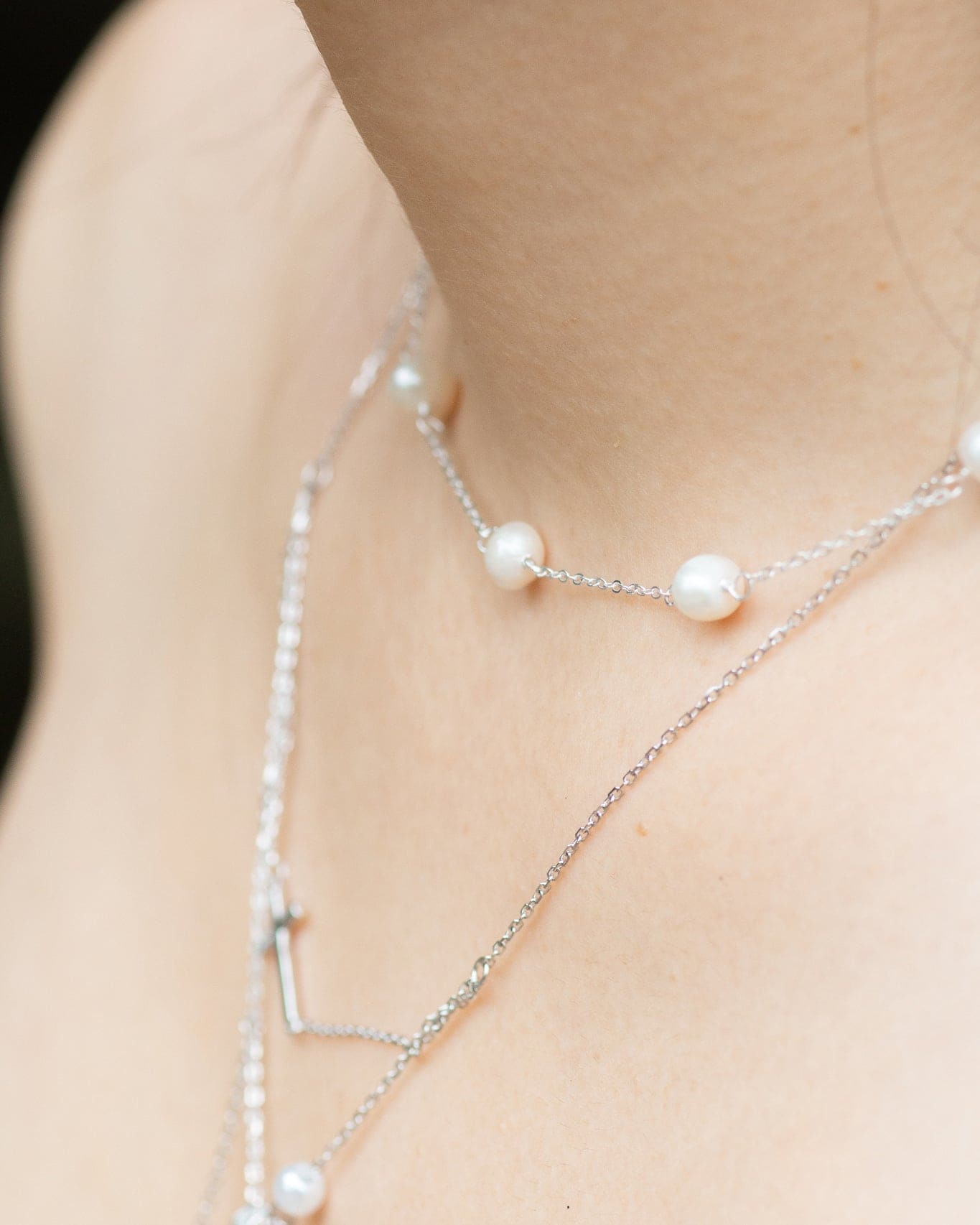 Yumei wearing classic pearl choker dainty sterling silver necklace