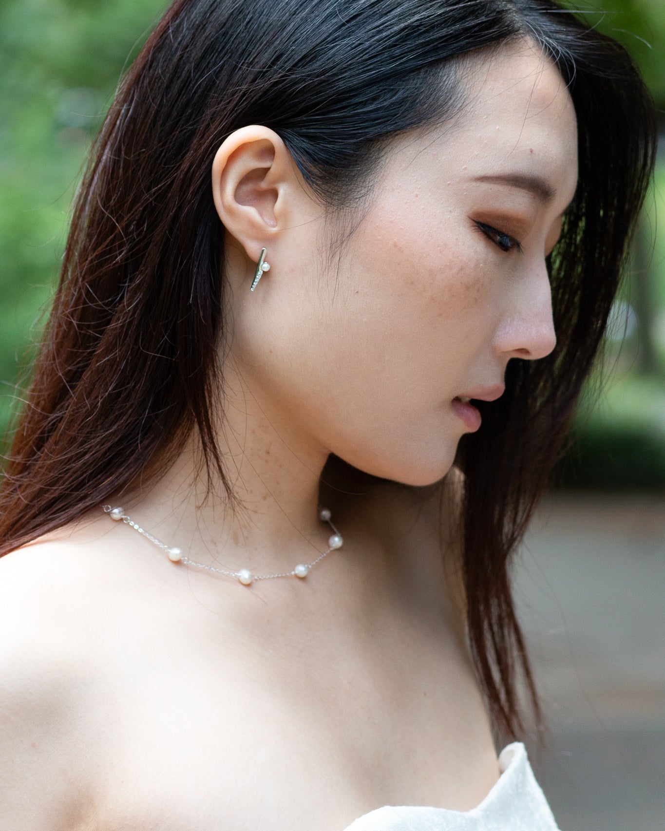 Yumei wearing classic pearl choker dainty sterling silver necklace