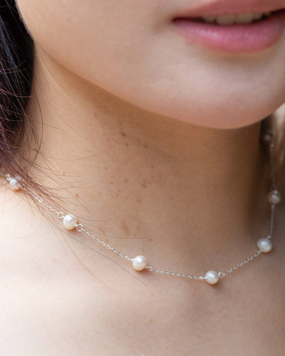 Yumei wearing classic pearl choker dainty sterling silver necklace