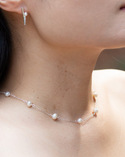 Yumei wearing classic pearl choker dainty sterling silver necklace