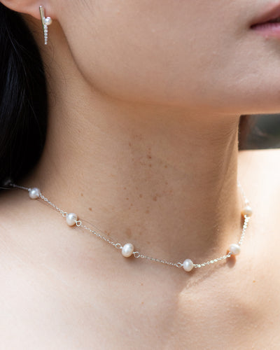 Yumei wearing classic pearl choker dainty sterling silver necklace