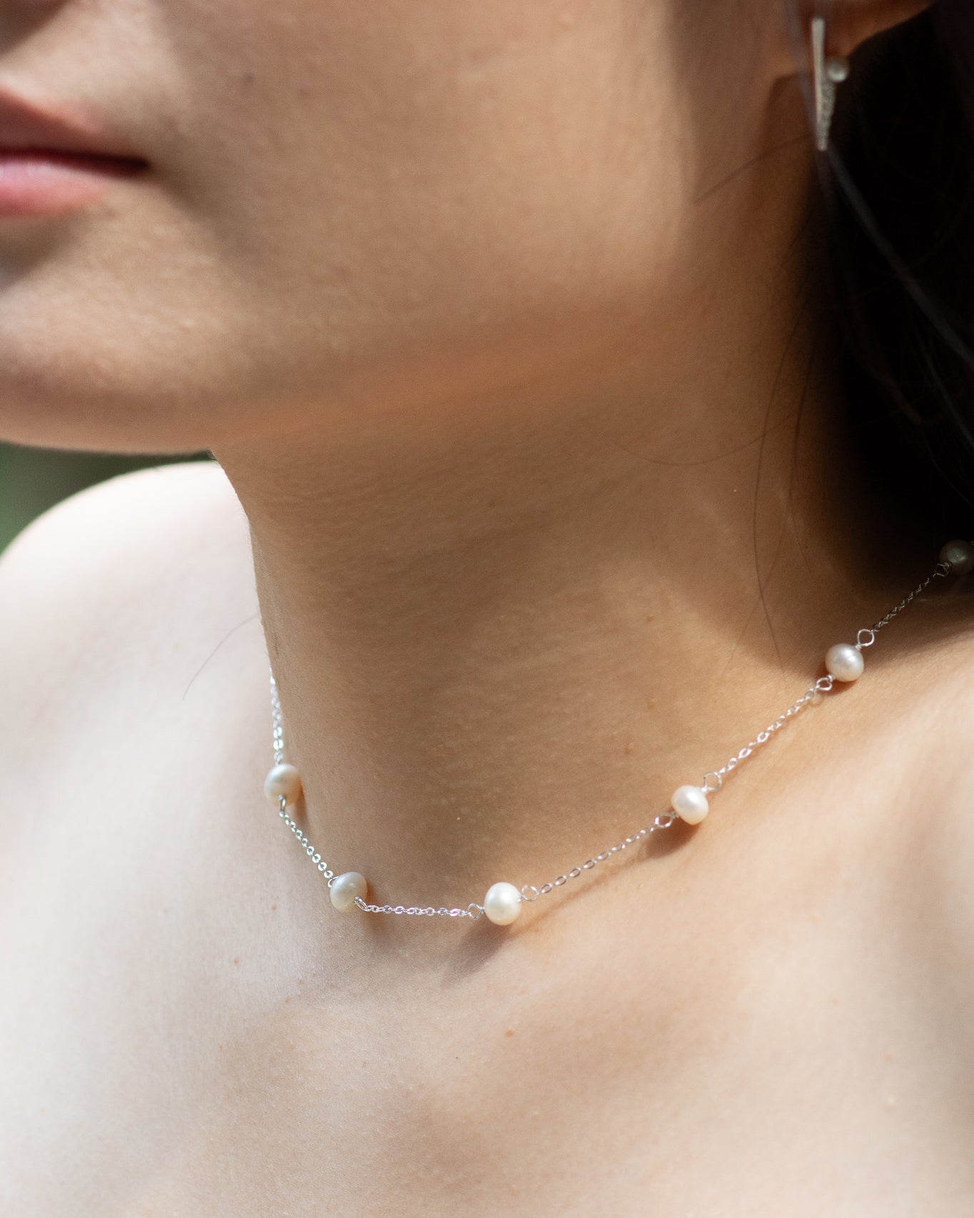 Yumei wearing classic pearl choker dainty sterling silver necklace