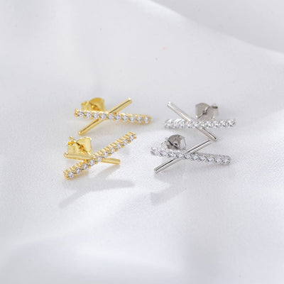 nolo xquisite asymmetrical irregular x shaped cubic zirconia gemstone gold plated sterling silver stud earrings