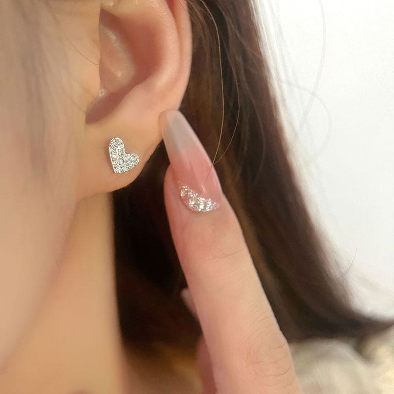 woman wearing nolo cute dainty asymmetrical heart shaped sterling silver gemstone stud earrings