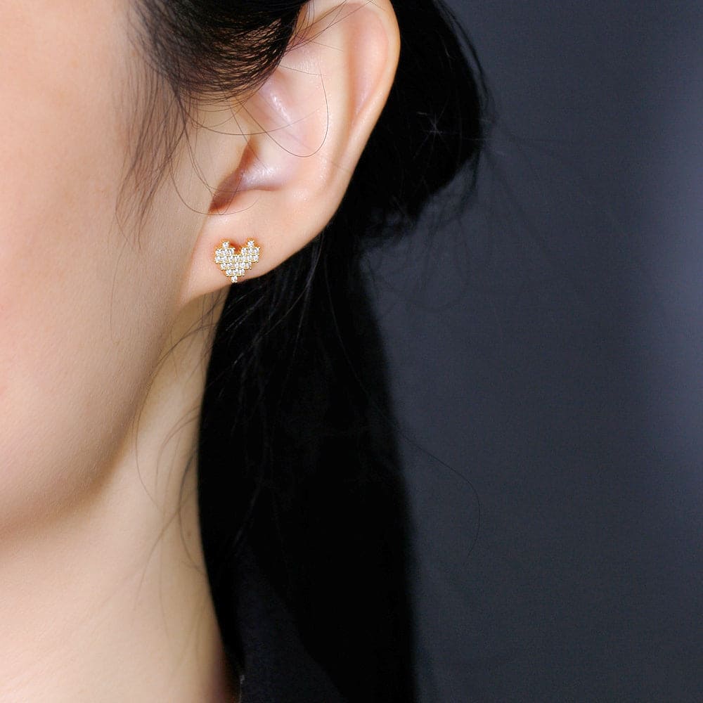woman wearing nolo cute dainty pixel love 8 bit heart gamer gold plated sterling silver stud earrings