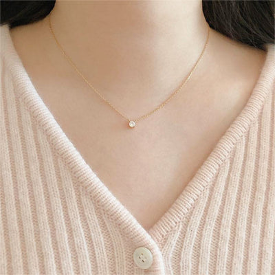 woman wearing nolo flor super dainty gemstone chain gold plated sterling silver necklace