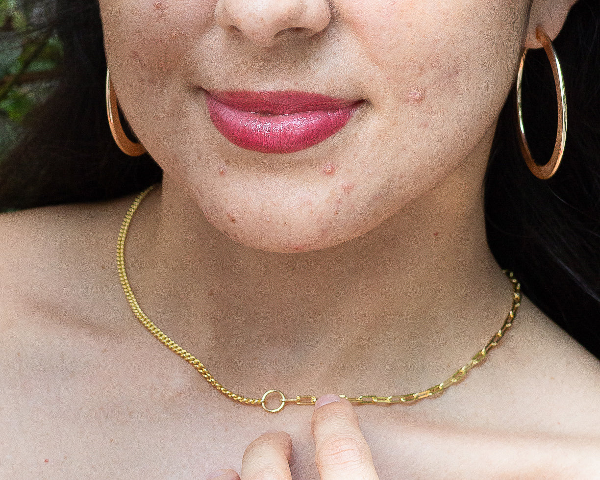 woman wearing nolo half and half paperclip and cuban link gold plated sterling silver splicing necklace