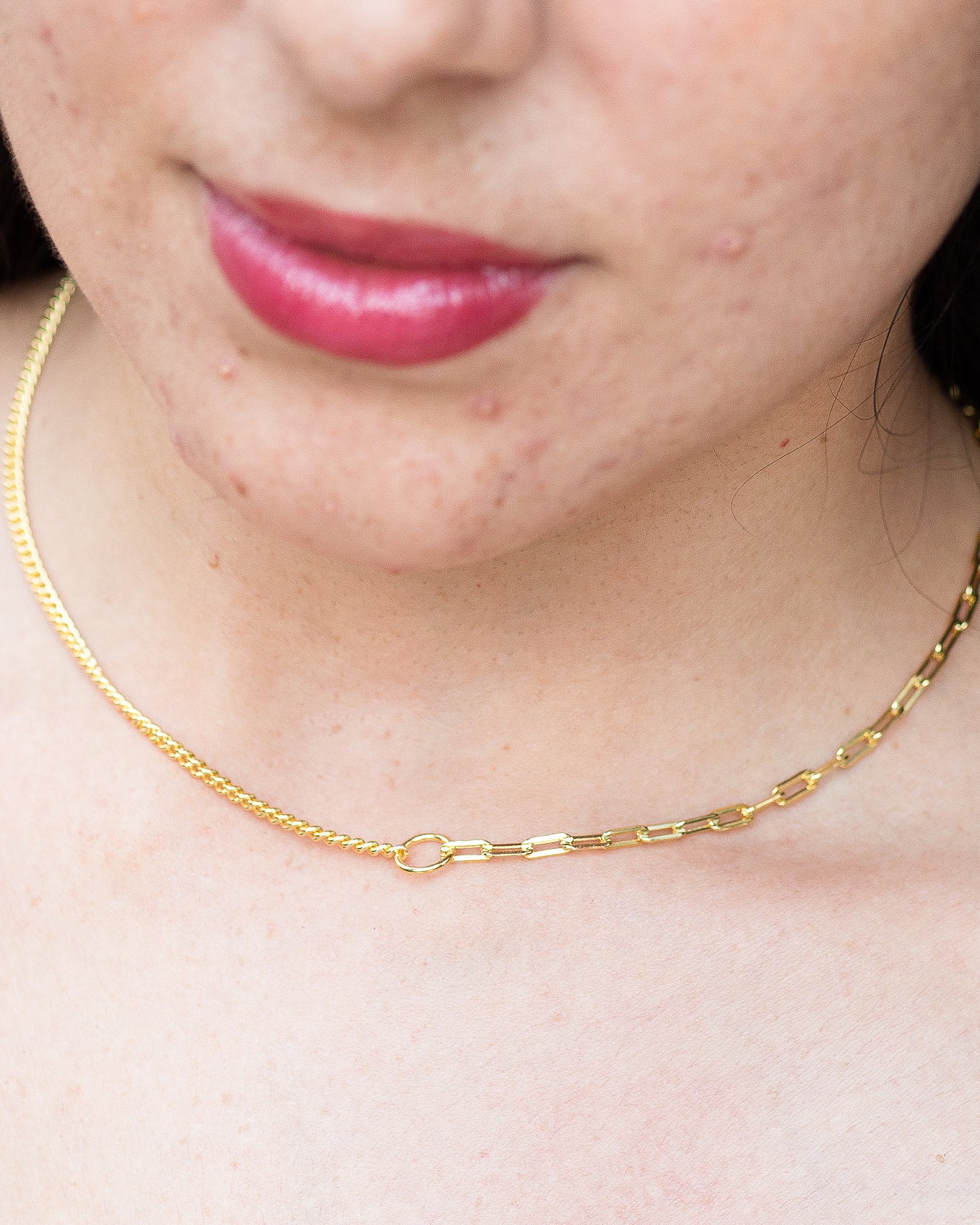 woman wearing nolo half and half paperclip and cuban link gold plated sterling silver splicing necklace