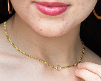 woman wearing nolo half and half paperclip and cuban link gold plated sterling silver splicing necklace