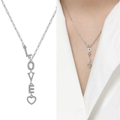 woman wearing nolo love letter heart vertical love spelling word silver rhodium plated dainty unique necklace