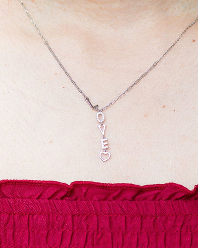 woman woman wearing nolo love letter heart vertical love spelling word silver rhodium plated dainty unique necklace