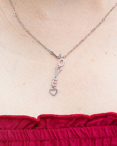 woman woman wearing nolo love letter heart vertical love spelling word silver rhodium plated dainty unique necklace