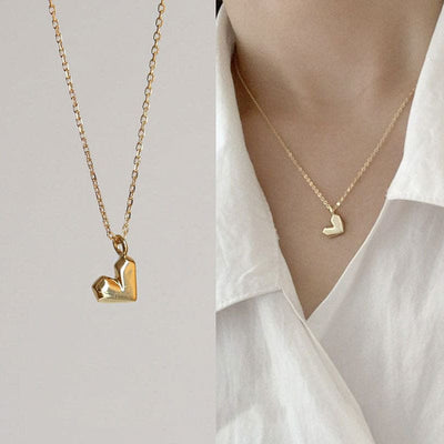 woman wearing nolo origami geometric angular cute dainty tiny small 18k gold plated sterling silver heart necklace