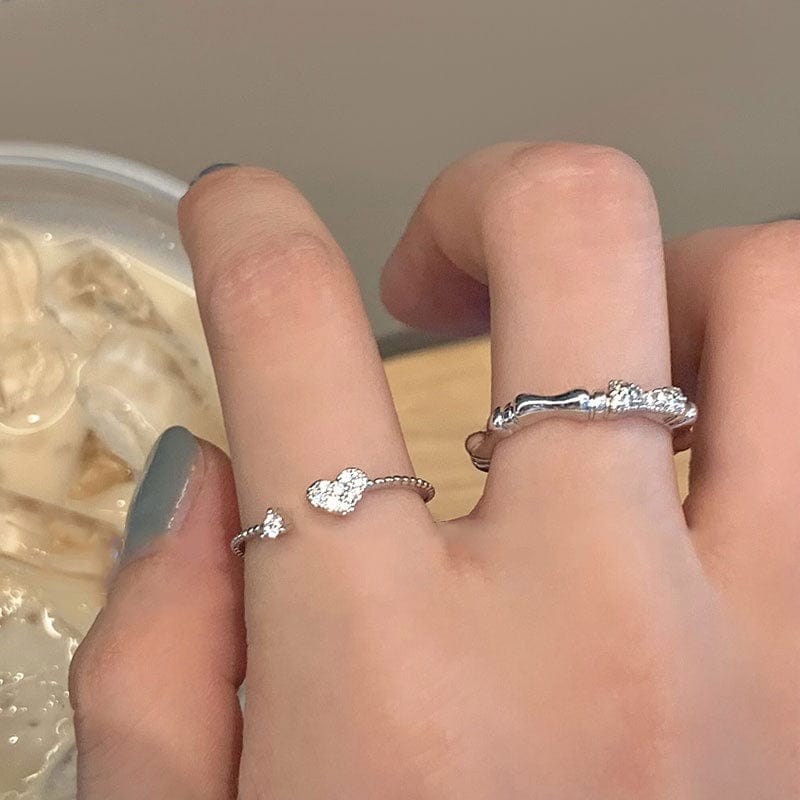 woman wearing nolo super cute dainty thin spiral adjustable open band 925 sterling silver heart cubic zirconia gemstone ring