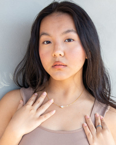 Mingma wearing 18k gold plated sterling silver nolo what the heart wants dainty chain link necklace