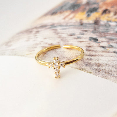 beautiful dainty sterling silver cross ring with cubic zirconia gemstones and gold plate