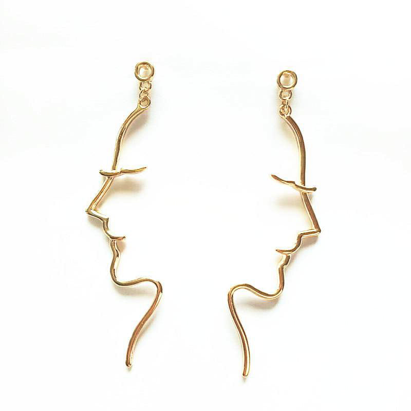 half girl woman face earrings gold color