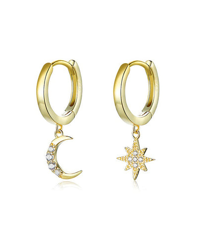 gold plated moon and star earrings set plain white background