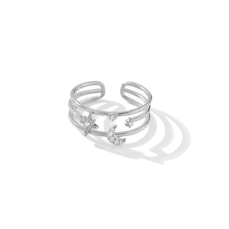 woman wearing triple layered moon and star sterling silver zirconia adjustable ring