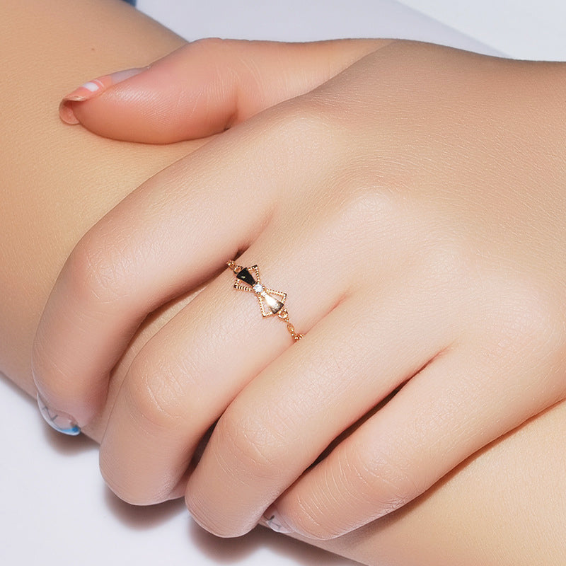 woman wearing bow tie bowknot adjustable chain ring 14k gold plated 925 sterling silver ring