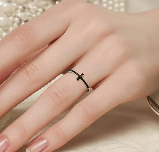 woman wearing nolo beautiful black zirconia sterling silver cross ring