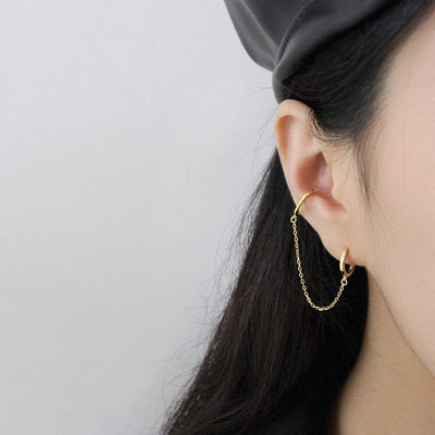 woman wearing nolo detachable connector connected sterling silver 18k gold plated huggie chain earrings