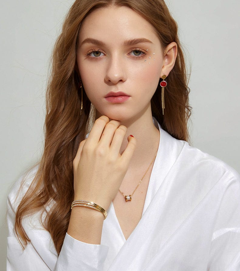 woman-wearing-nolo-fairy-gold-stackable-3-piece-sterling-silver-bracelet