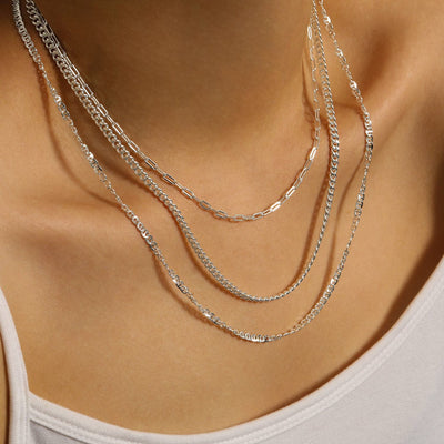 woman wearing rolo chain link sterling silver necklace