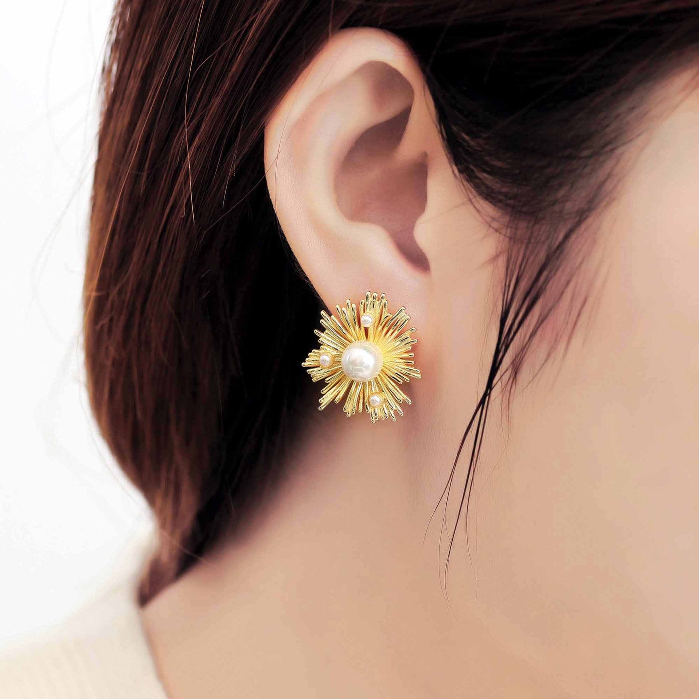 woman wearing sunflower shell pearl 18k yellow gold plated 925 sterling silver earrings